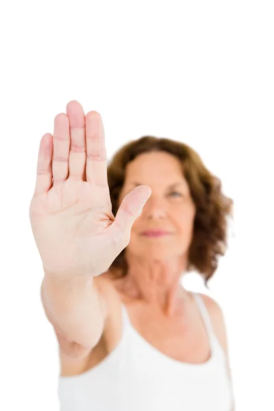 Vrouw met stopbord — Stockfoto