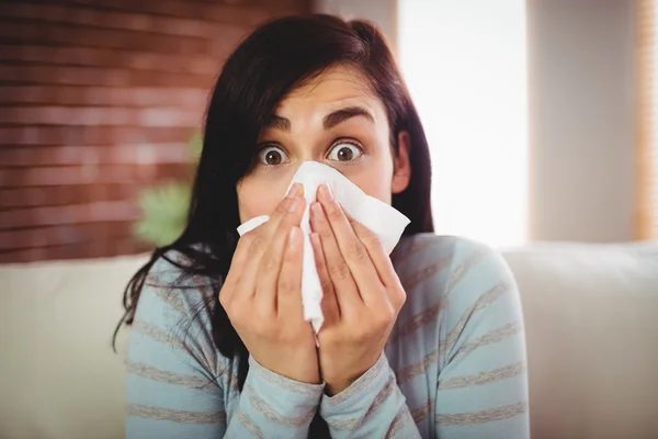 Shocked young woman at home — Stock Photo, Image