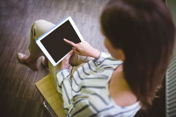 Executive using tablet at office — Stock Photo, Image