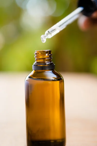 Aromatherapy oil with dropper — Stock Photo, Image