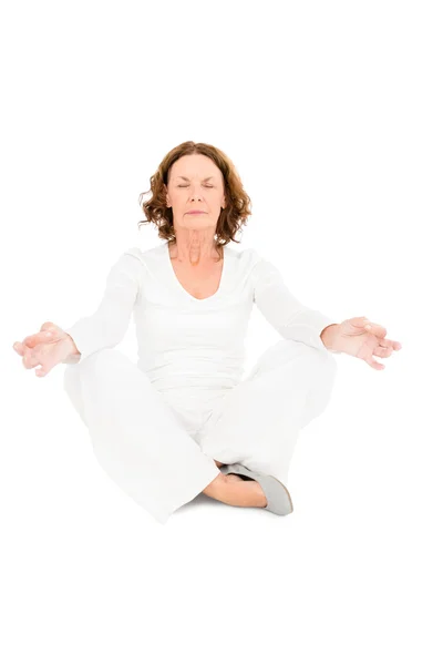 Mulher meditando contra branco — Fotografia de Stock