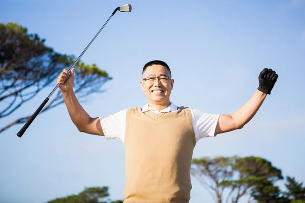 Golfer raising his hands — Stock Photo, Image