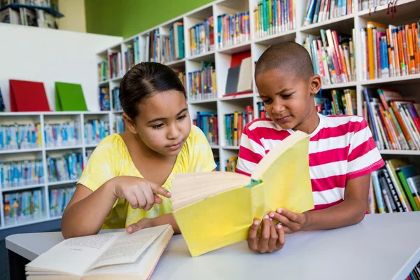 Students reading book — Stock Photo, Image