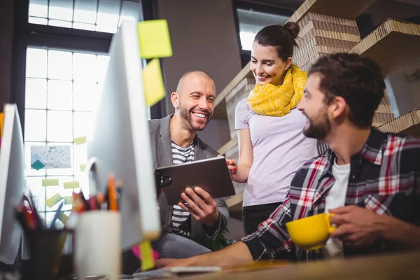 Cheerful business people in creative office — Stock Photo, Image