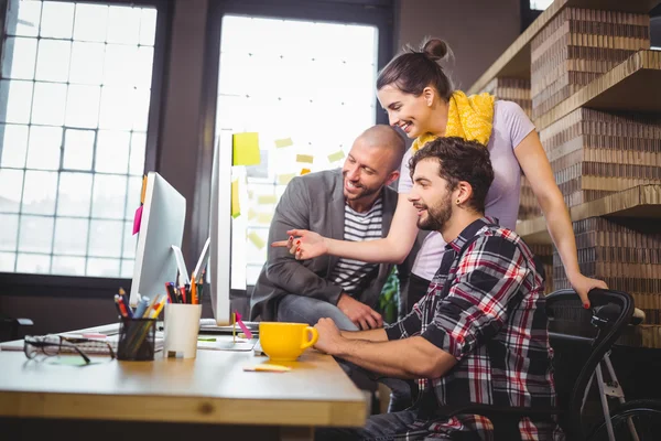 Coworkers working at computer desk — Stock Photo, Image