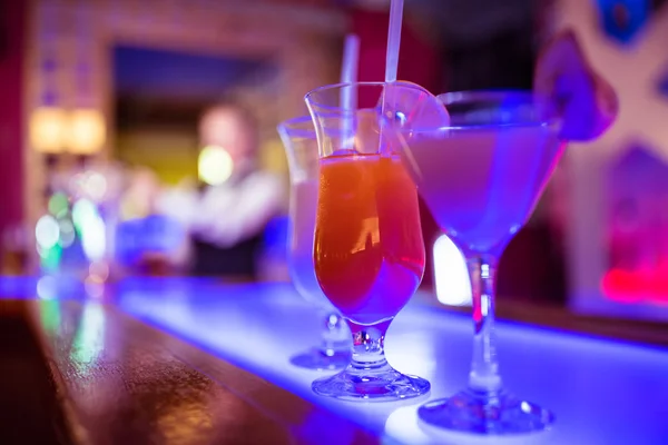 Drinks on illuminated counter — Stock Photo, Image