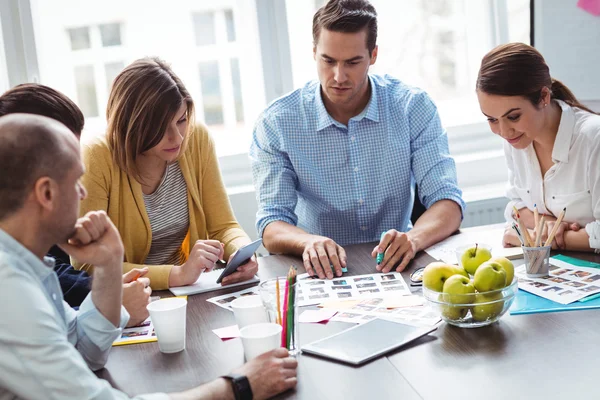 Editors with documents working — Stock Photo, Image