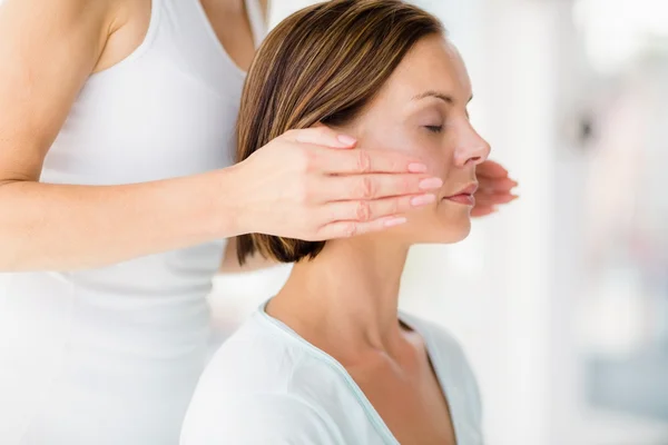 Woman receiving massage treatment — Stock Photo, Image