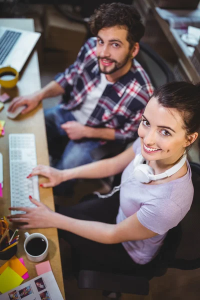Coworkers working at computer desk — Stock Photo, Image