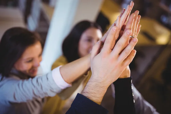 Creative business people high fiving — Stock Photo, Image