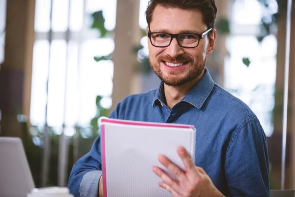 Executive with documents at office — Stock Photo, Image