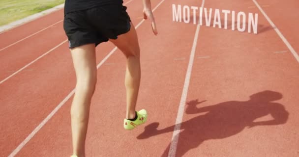 Athlete feet running on the running track — Stock Video