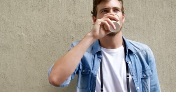 Man having coffee from disposable cup — Stock Video