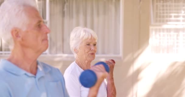 Senior couple exercising together — Stock Video