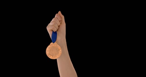 Hands throwing a medal — Stock Video