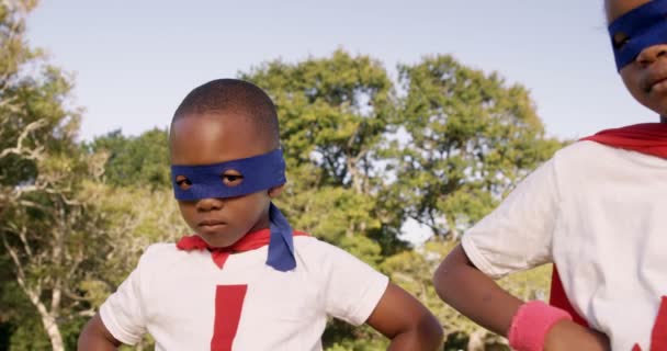 Family posing in costume of superheroes — Stock Video