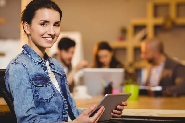 Female graphic designer holding digital tablet — Stock Photo, Image