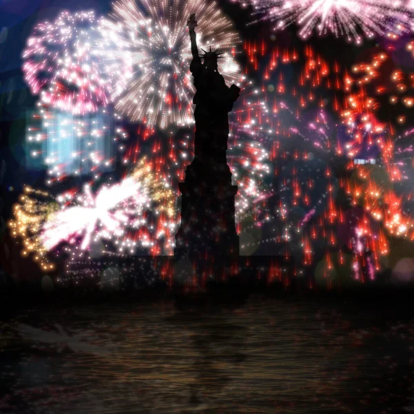 Liberty statue against colourful fireworks — Stock Photo, Image
