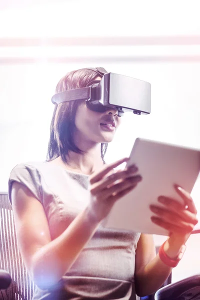 Businesswoman using virtual glasses — Stock Photo, Image