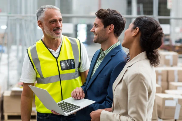 Worker team is looking each other and laughing — Stock Photo, Image