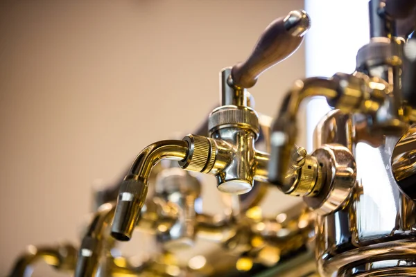 Close-Up of beer pump in a row — Stock Photo, Image