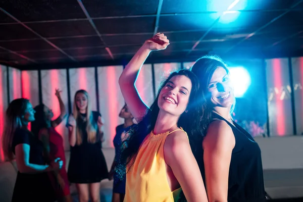 Friends dancing on dance floor — Stock Photo, Image