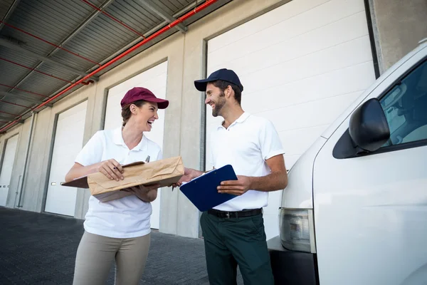 Delivery people are looking each other — Stock Photo, Image