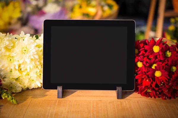 Close-up of digital tablet on table — Stock Photo, Image