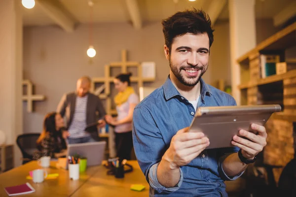 Graphic designer holding digital tablet — Stock Photo, Image