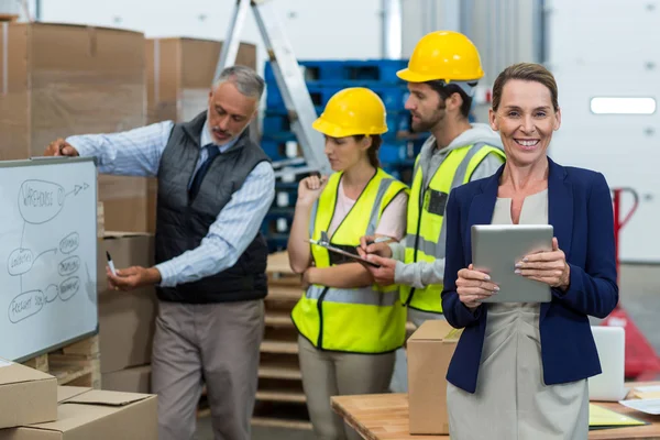 Warehouse team having a meeting — Stock Photo, Image