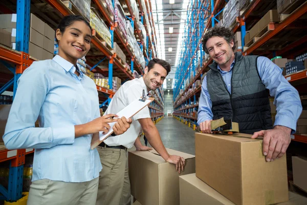 Portrait of happy managers are posing during work — Stock Photo, Image