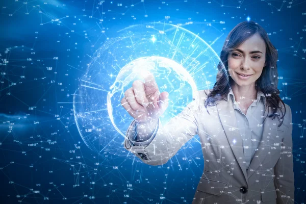 Businesswoman touching invisible screen — Stock Photo, Image