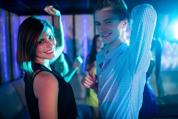 Friends dancing on dance floor — Stock Photo, Image