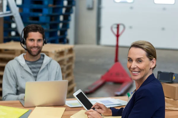 Smiling worker looking at camera — Stock Photo, Image
