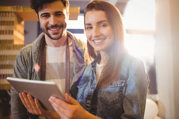 Portrait of graphic designer with his coworker looking at digita — Stock Photo, Image