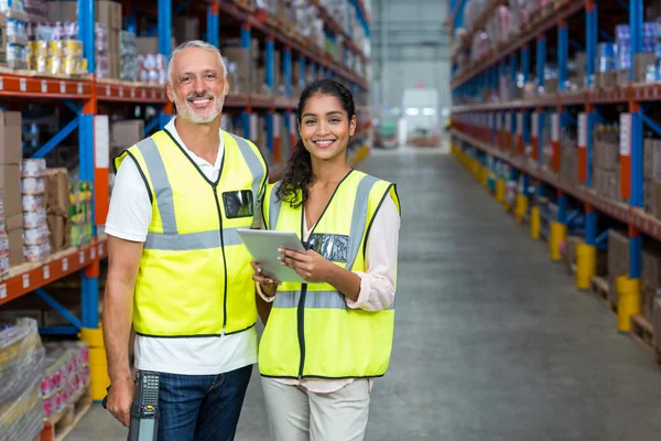 Happy workers are posing and smiling to the camera — Stock Photo, Image