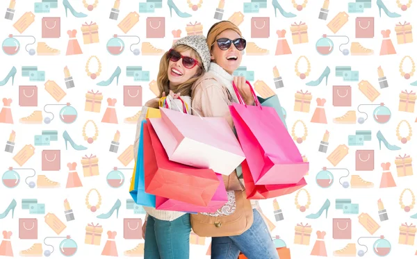 Mulheres segurando sacos de compras — Fotografia de Stock