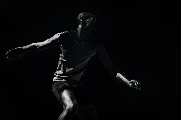 Athlete man throwing a discus — Stock Photo, Image