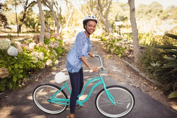 Happy woman doing bicycle — Stock Photo, Image