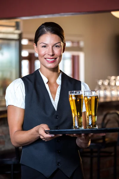 Portrait of waitress holding serving tray — Stock Photo, Image