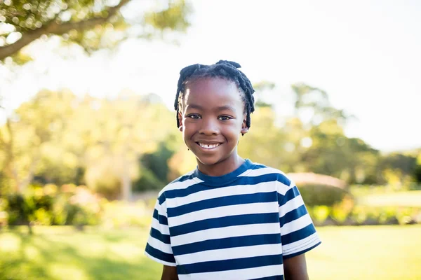 Boy smiling in front of the camera — Stock Photo, Image