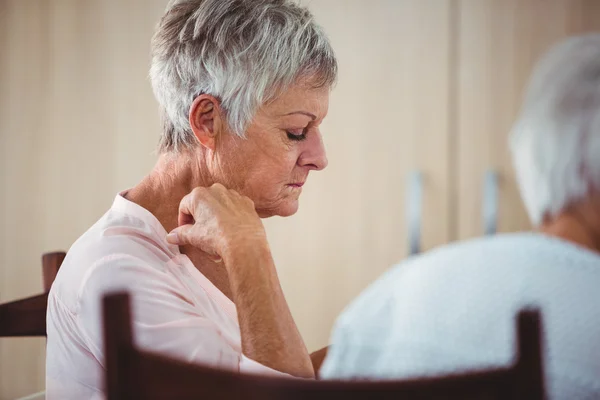 Side of a senior looking sad woman — Stock Photo, Image