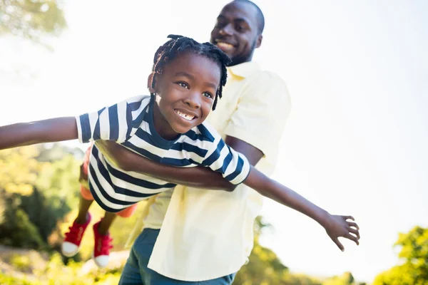 Happy family enjoying together — Stock Photo, Image