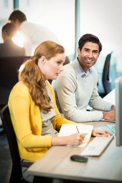 Man working with the coworker — Stock Photo, Image