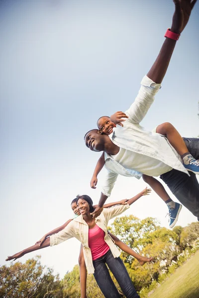 Happy family enjoying together — Stock Photo, Image