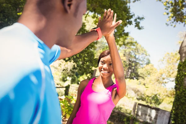 Couple doing a handshake together — Stock Photo, Image