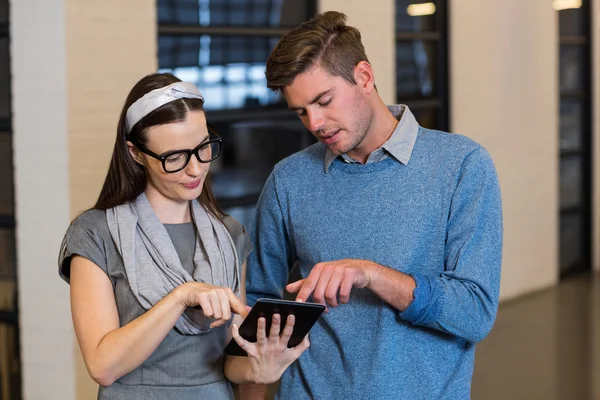 Colleagues using digital tablet — Stock Photo, Image