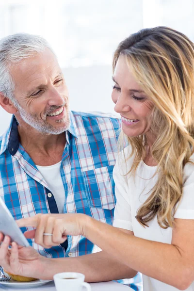 Woman pointing on digital tablet — Stock Photo, Image