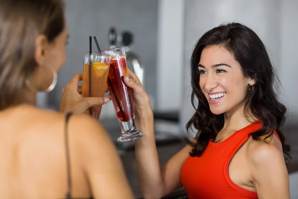 Two beautiful women having cocktail — Stock Photo, Image