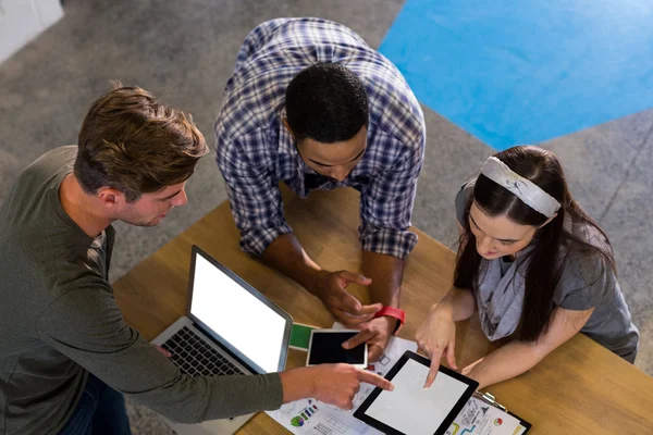 Colleagues using technologies — Stock Photo, Image